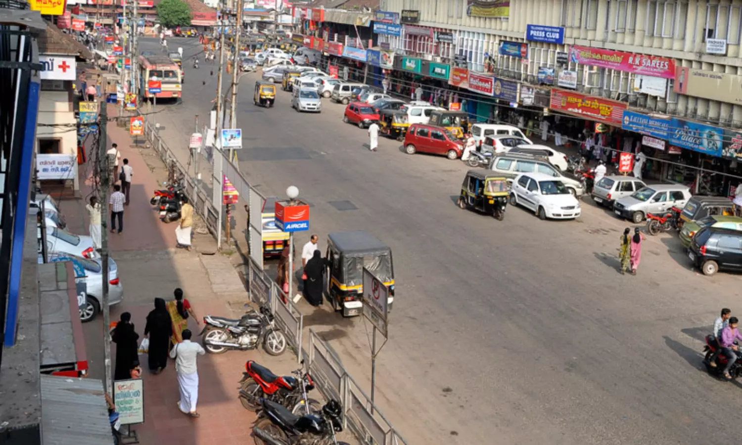 Why has not Thalassery awakened from the British era yet?