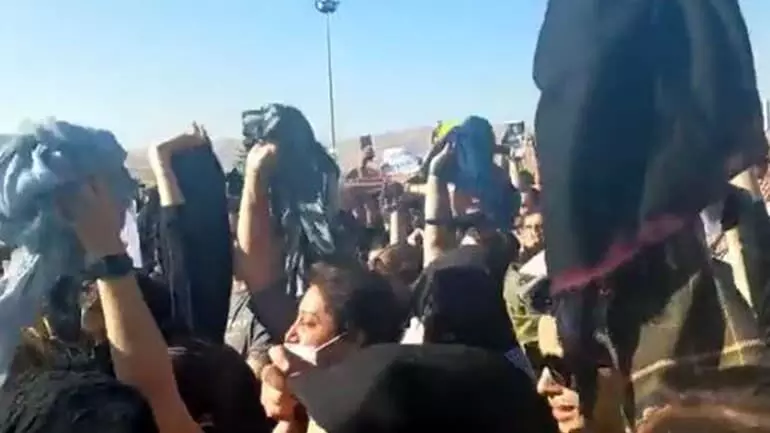 Iranian women take off hijab, protest Aminis death after morality police arrested her