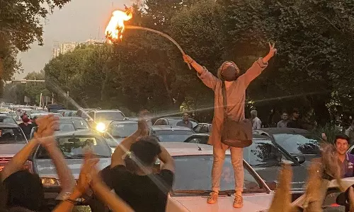 Anti-hijab protests spread across Iran; thousands in streets, internet curbed.