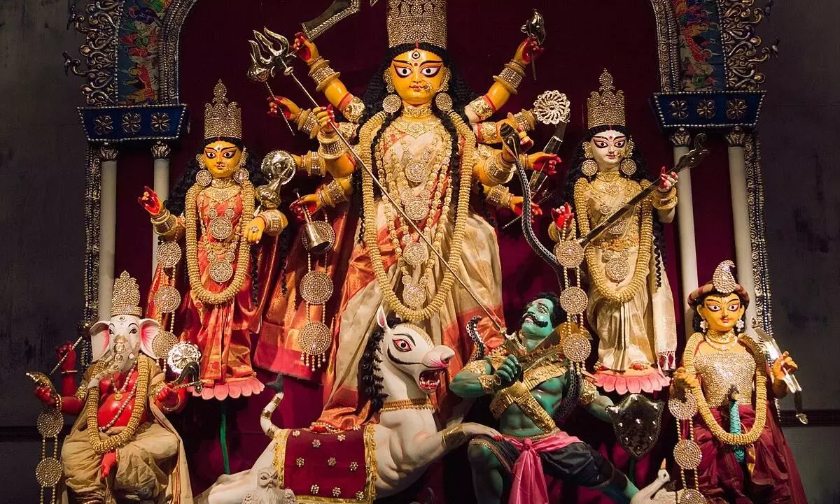 Mahisasura with Gandhjjis face; Durga idol in Kolkata sparks row