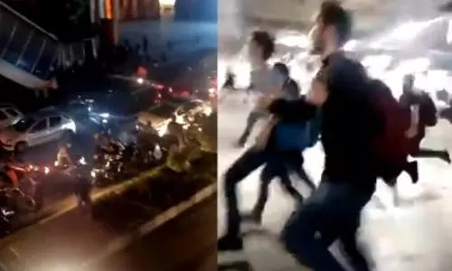 Tehran: Police-protesters clash; students trapped inside a university