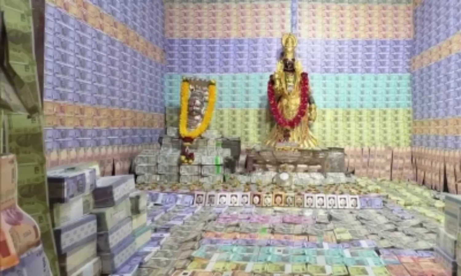 Andhra temple decorated in money and gold for Navratri
