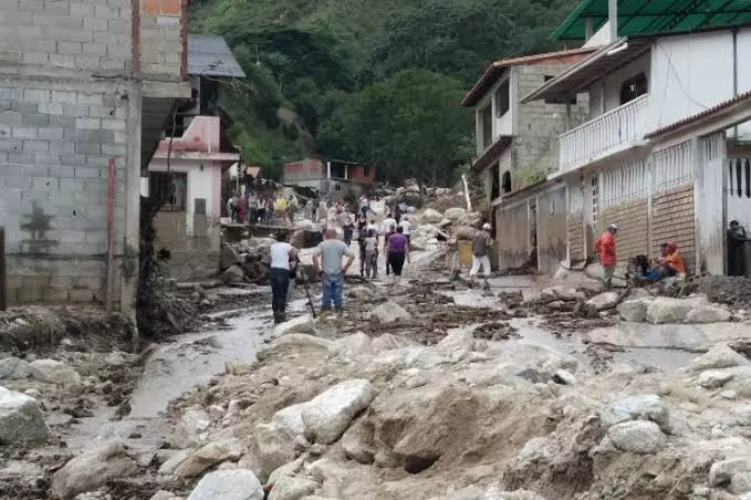 Rain-fuelled landslide sweeps through Venezuela town; 22 dead