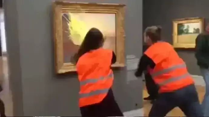 German activists throw mashed potatoes at Monet painting