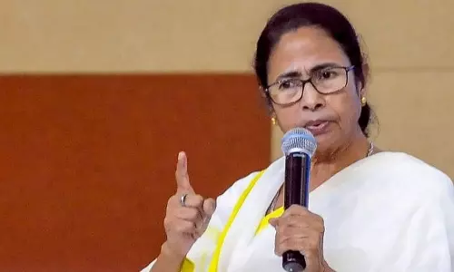 Wont let CAA be implemented asserts Mamata; it will be done says union minister