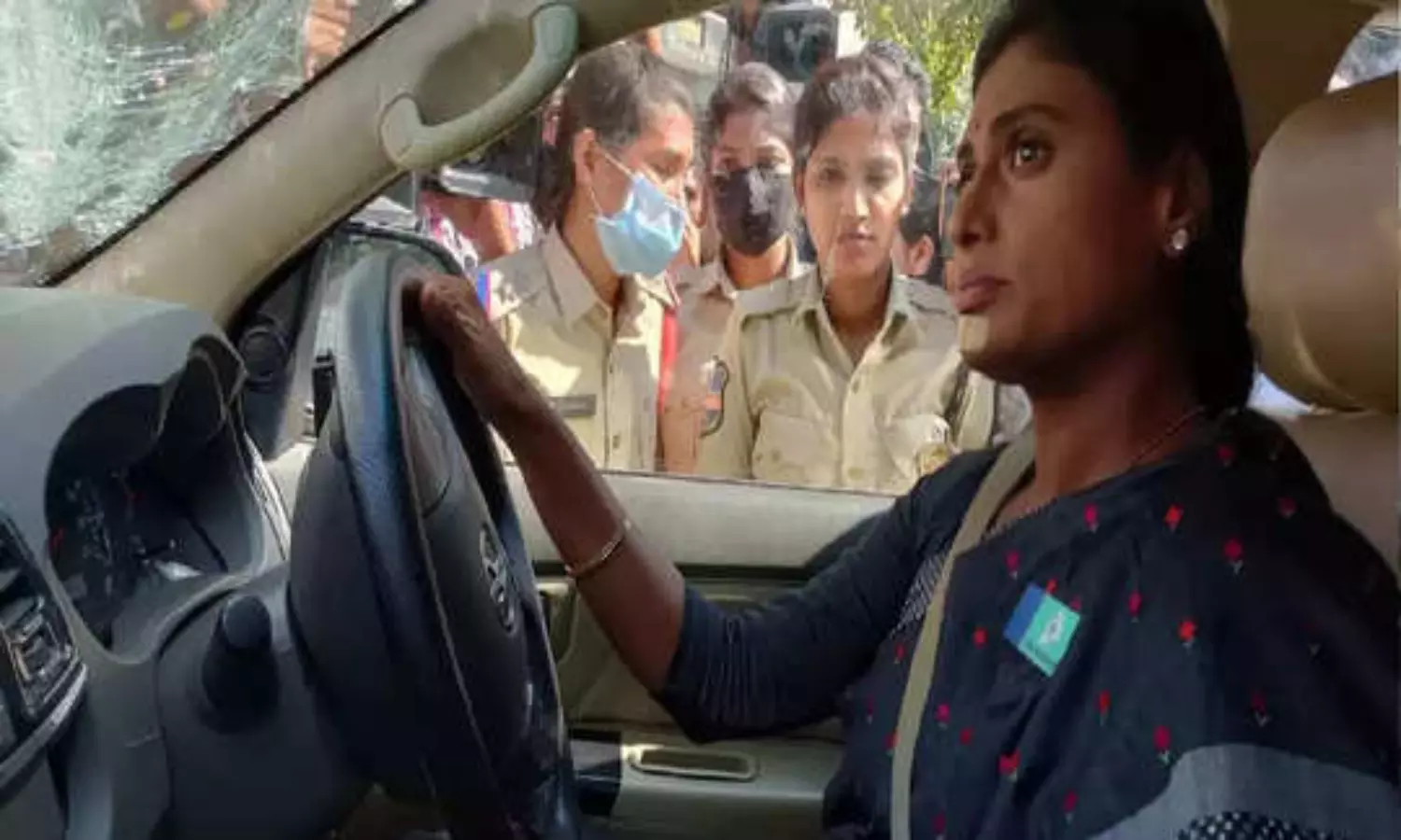 Telangana cops tow away politicians car with her in it