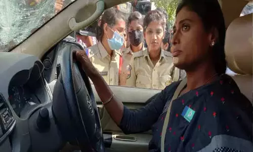 Telangana cops tow away politicians car with her in it
