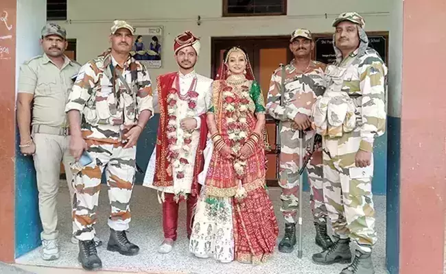 Gujarat polls: couple cast vote in wedding attire, photos go viral