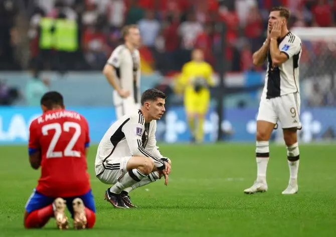 German world cup hopes take a tumble as Japan, Spain progress to knockouts
