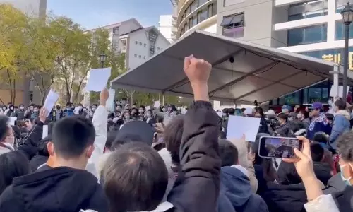 Chinese students protest against Covid lockdown at a university
