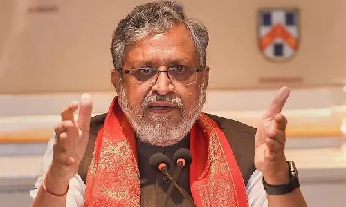 Sushil Modi proposes gradual phasing out of 2000 rupee currency notes