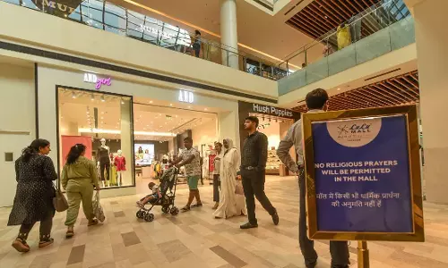 UP woos investors:  signs MoU with LuLu Group for six shopping malls