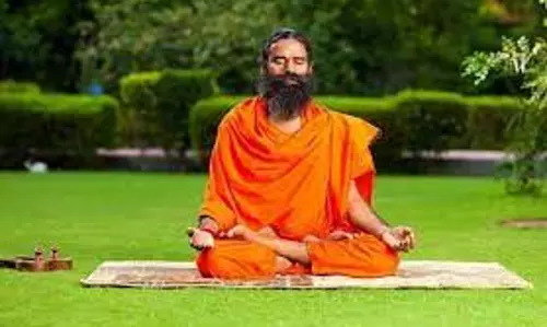 Cartoonists sued for making obscene posters of Baba Ramdev