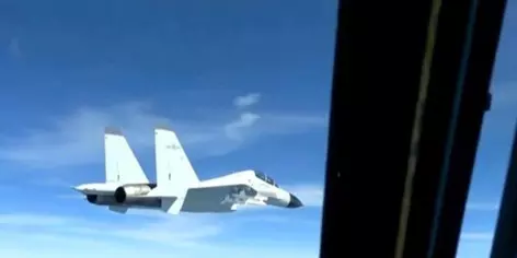 Chinese warplane came ‘dangerously’ close to US aircraft over China Sea Chinese warplane came ‘dangerously’ close to US aircraft over China Sea