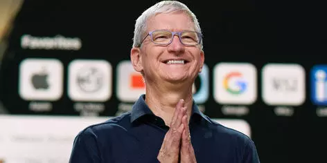 In a rare move Apple CEO Tim Cook takes a 40% pay cut