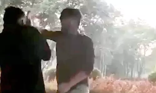 Telangana BJP chiefs son filmed assaulting a student, charged