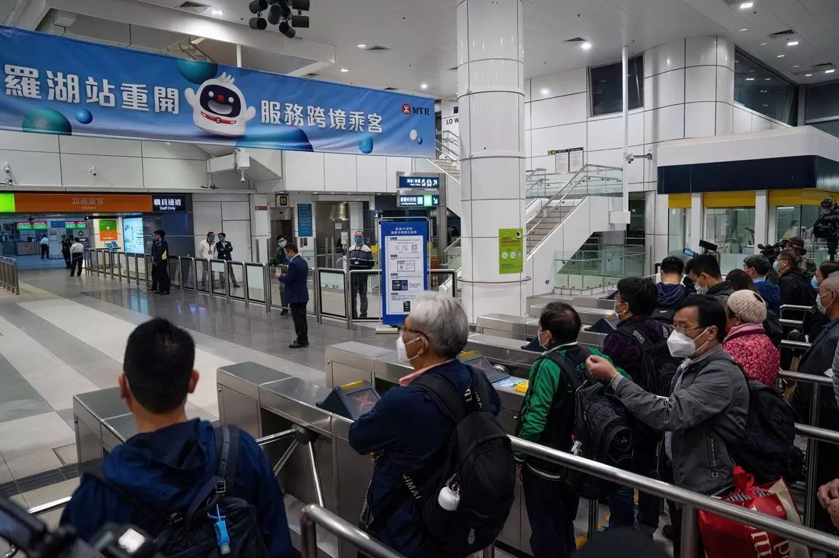 Hong Kong-China border reopens, no Covid isolation