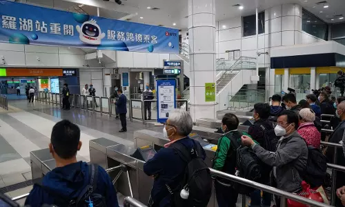 Hong Kong-China border reopens, no Covid isolation