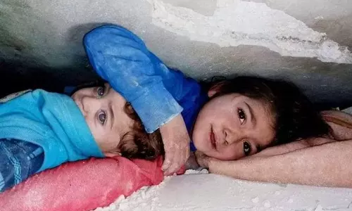 Turkey earthquake: Heartbreaking picture of a 7-year-old shielding her brother under rubble in Syria goes viral