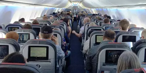 Student urinates on a passenger in New York-New Delhi plane