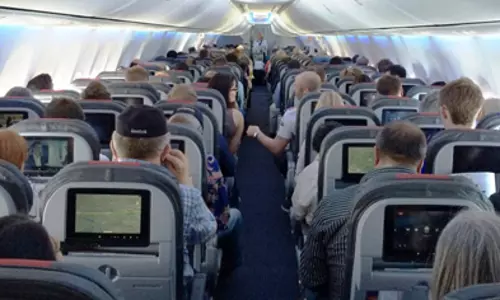 Student urinates on a passenger in New York-New Delhi plane