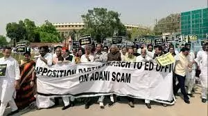 Opposition MPs march to ED office demanding probe in Adani row