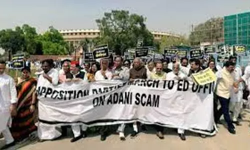 Opposition MPs march to ED office demanding probe in Adani row
