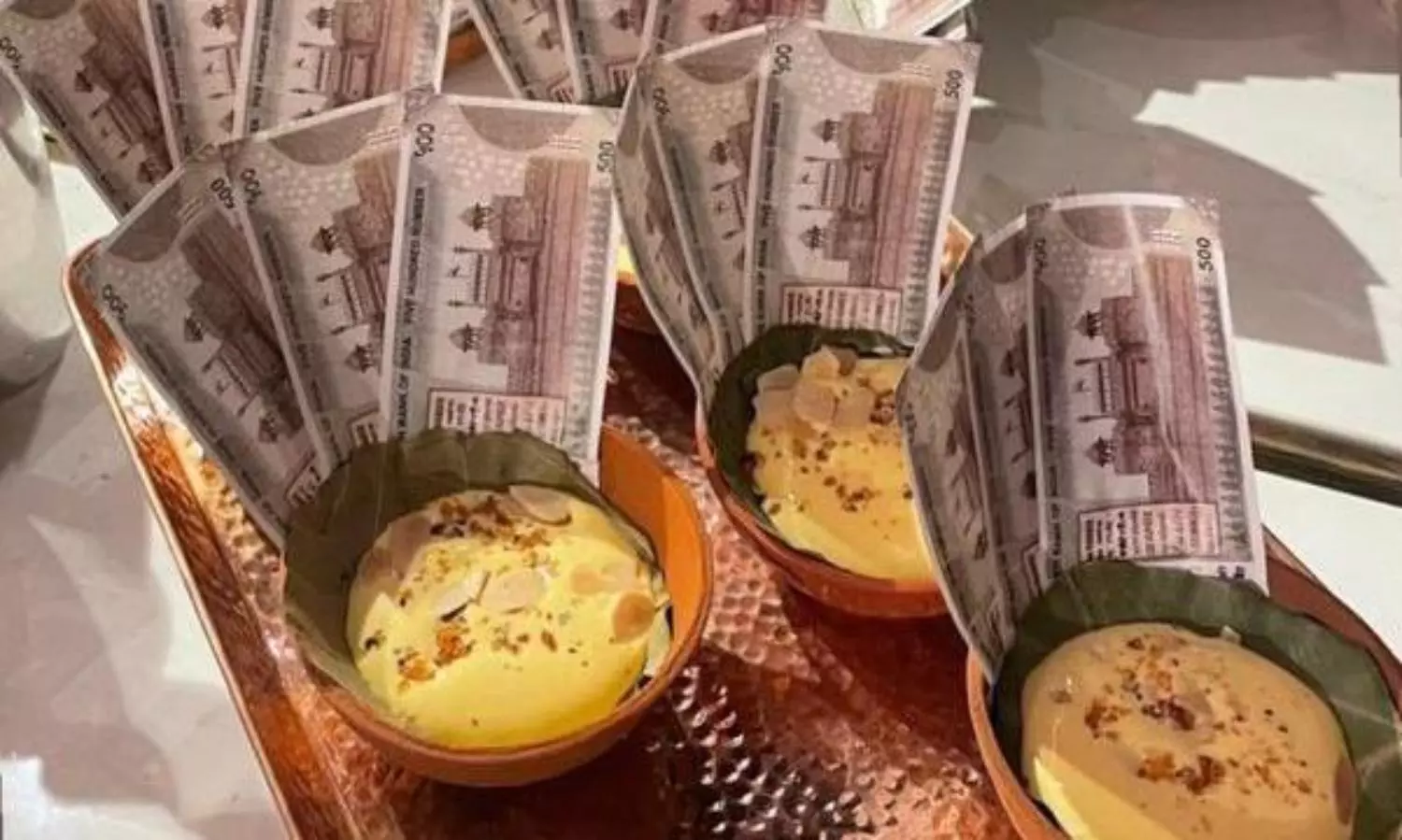 Dessert served with Rs 500 notes as tissues at Ambanis party?