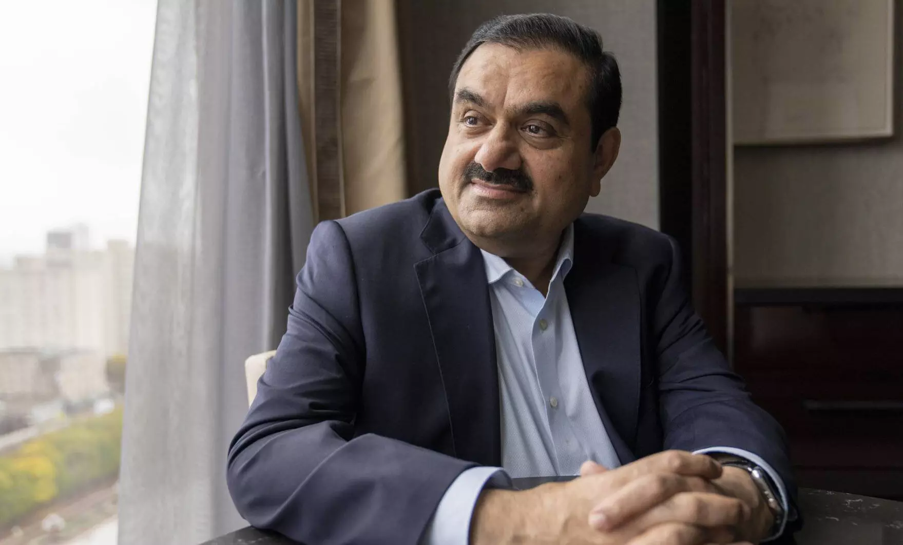 Adani Group to focus more on green energy after surging profits: report