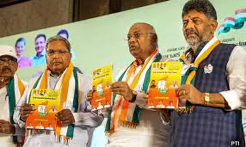 Cong releases manifesto for Karnataka with five guarantees, a promise to ban divisive organisations