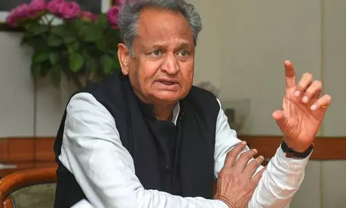 Alleging using religion, Rajasthan CM urges EC to ban PM from campaigning in Ktaka