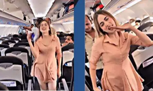 Woman dancing to a song on a flight goes viral, amassing massive views