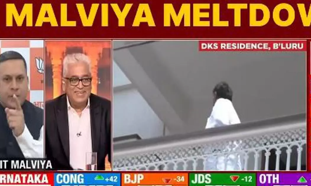 Malviya calls Sardesai Cong propagandist on live TV, Sardesai shares Mysore Pak