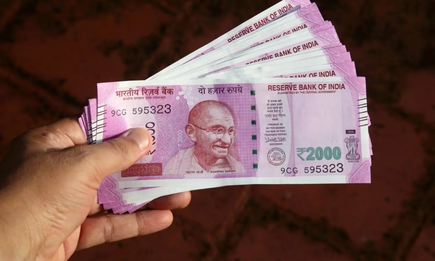 Notification permitting Rs 2000 note exchange without ID proof challenged