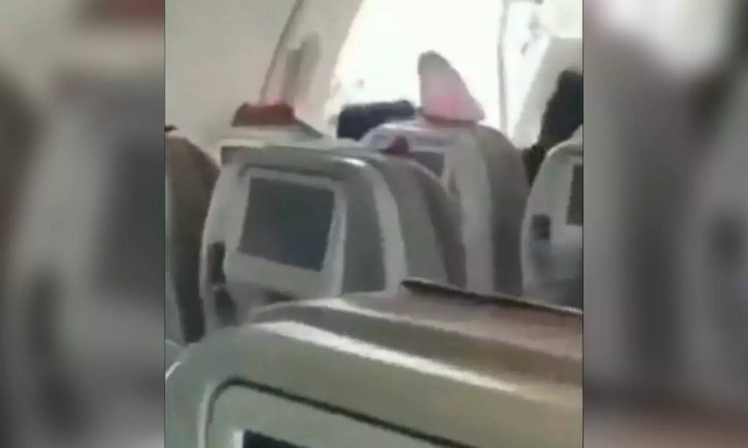 Wind rips through as passenger opens flights emergency exit midair