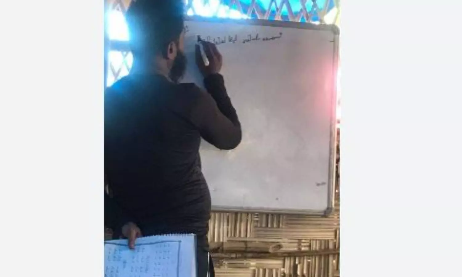 Rohingya refugees harness power of WhatsApp groups to revive language and identity