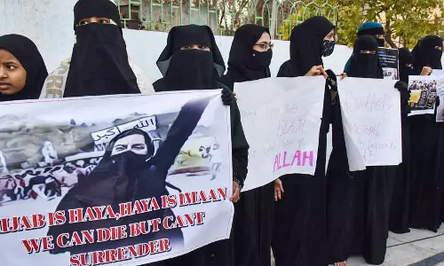 BJP accuses Siddaramaiah of appeasing PFI goondas by lifting hijab ban