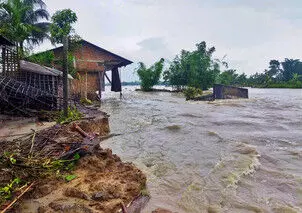 With rivers flowing over red mark, Assams flood scenario still dire