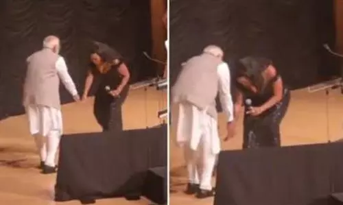 American singer Mary Millben sings India’s national anthem; touches PM Modi’s feet