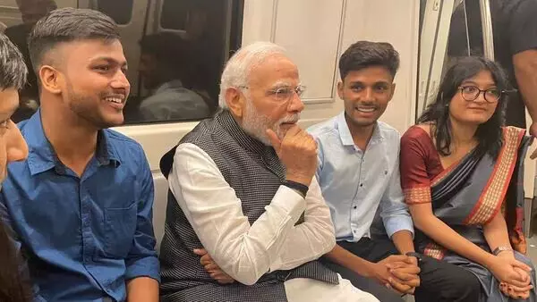 PM Modi takes Metro ride on his way to DU