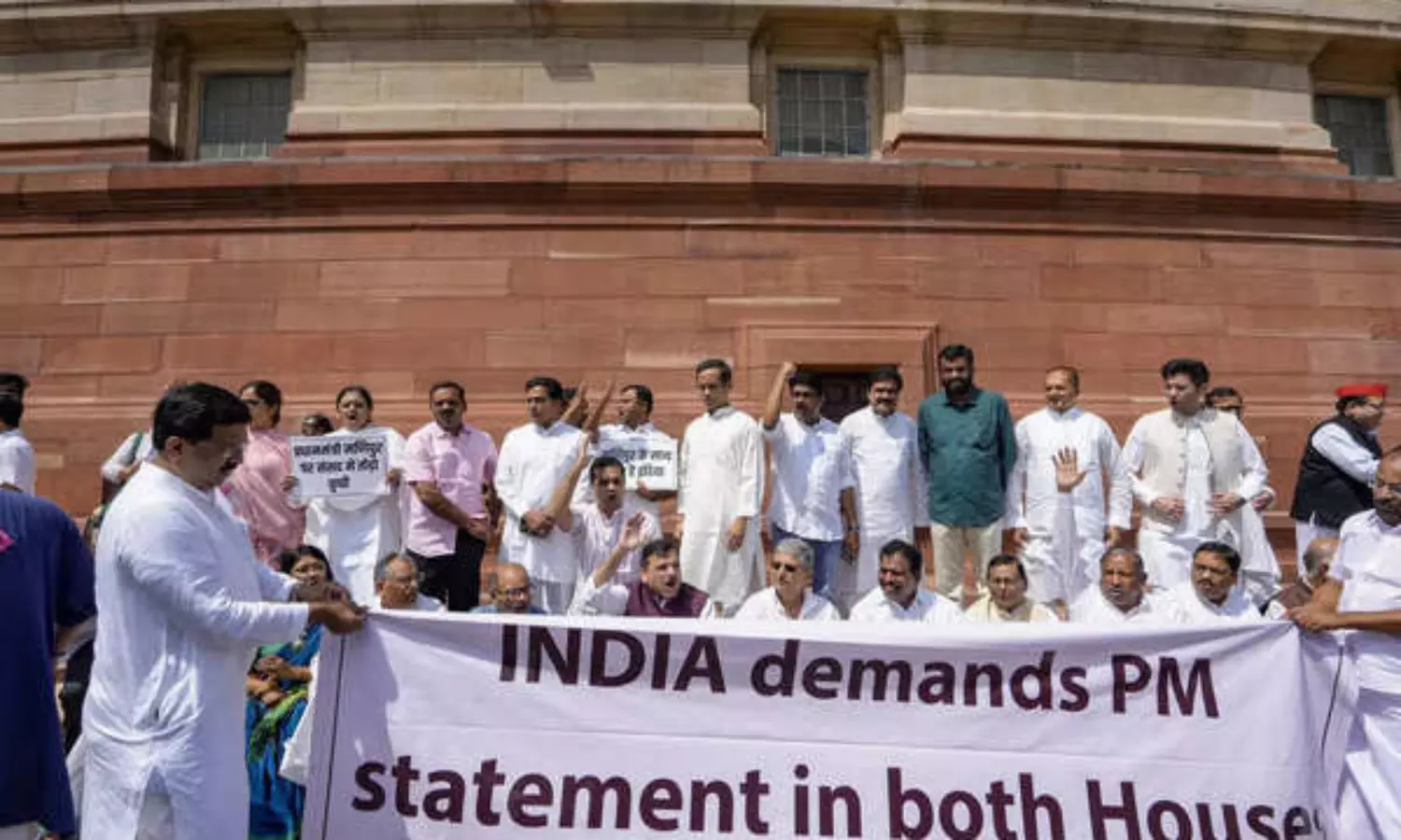 INDIA alliance demands PMs statement on Manipur; protests AAP MPs suspension