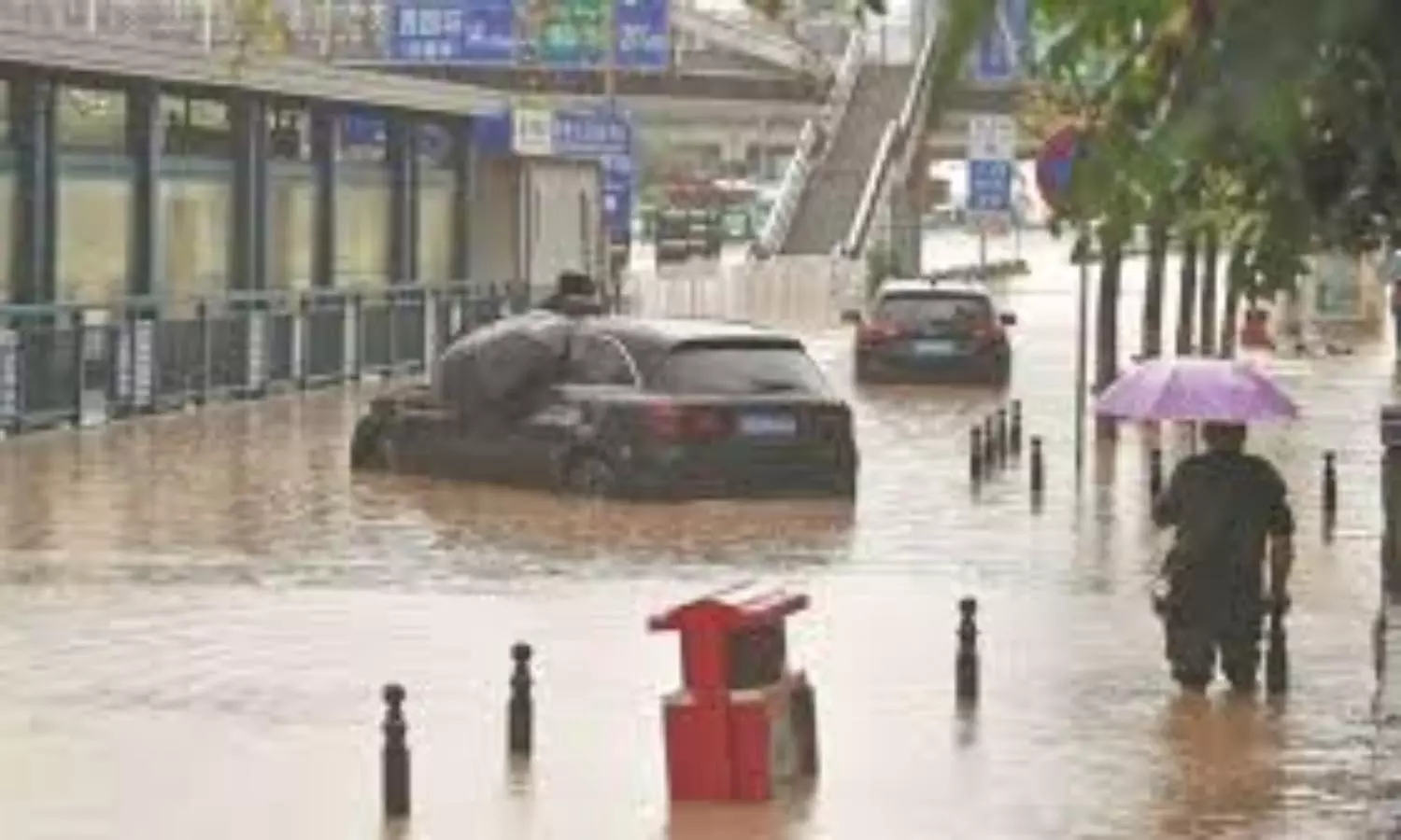 Heaviest rains in 140 years batter Beijing as China shies away from climate talks