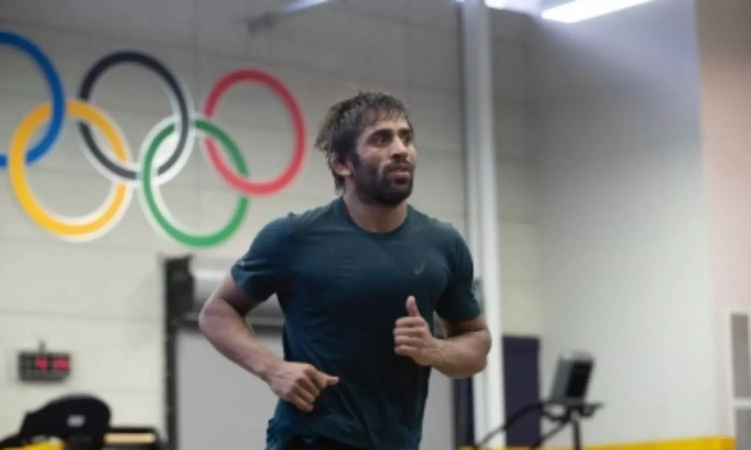 Ahead of WFI elections, Vinesh Phogat, Bajrang Punia return to India