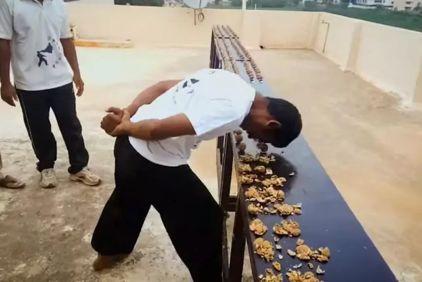 Indian man creates world record for most walnuts cracked with head in a minute