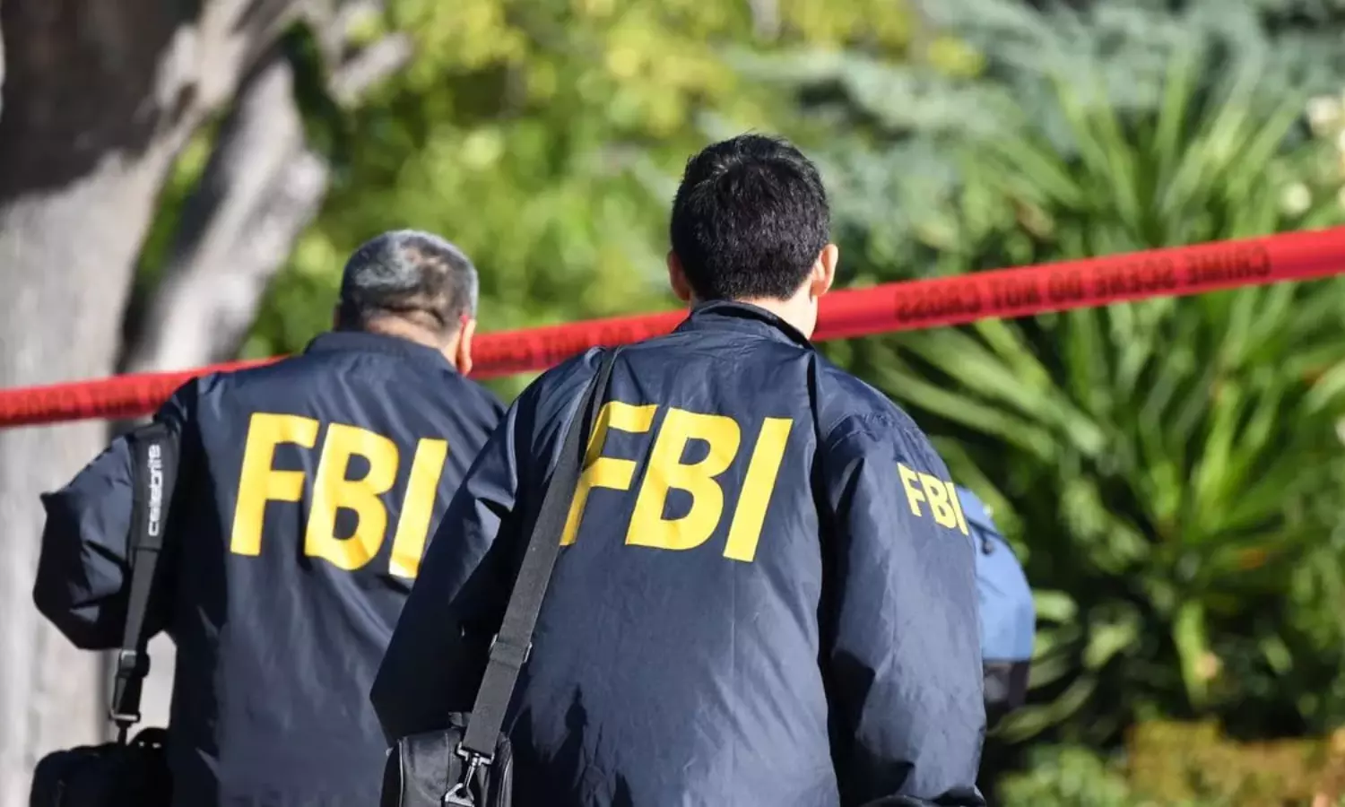 Man accused of threatening Joe Biden shot dead in FBI raid
