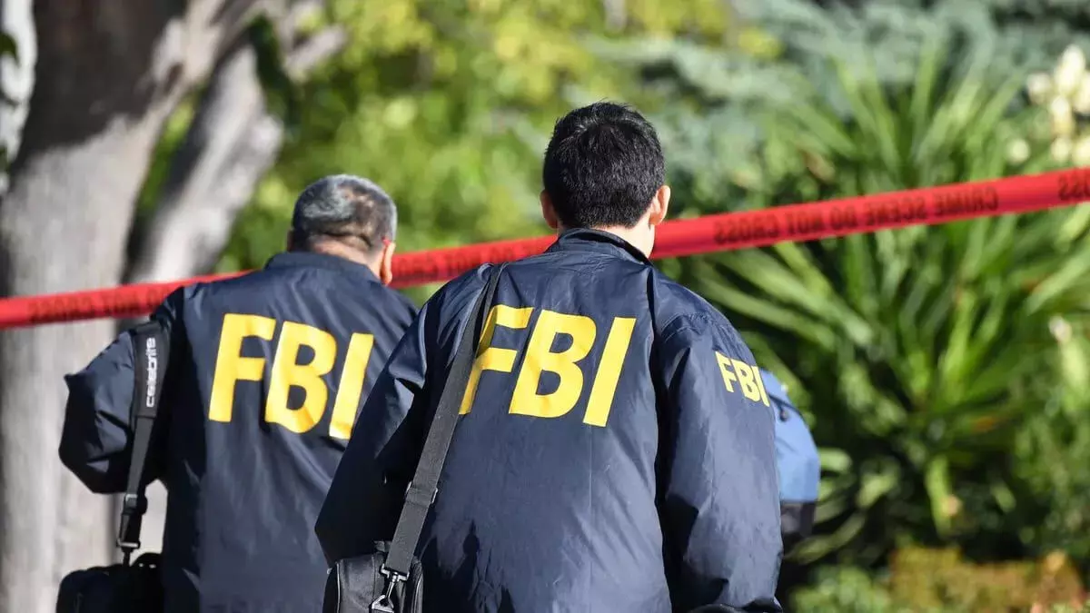 Man accused of threatening Joe Biden shot dead in FBI raid