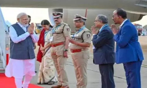 PM Modi lands in Bengaluru to meet scientists at ISRO