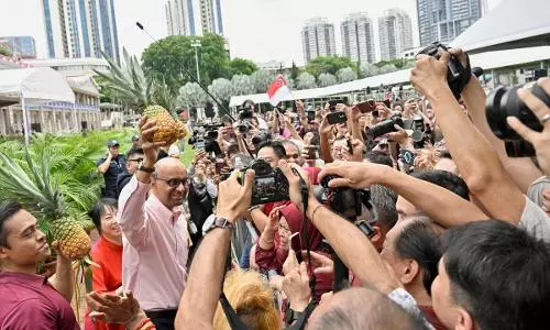 Tharman, Indian-origin ex-minister in race as Singapore to vote on new president on Friday