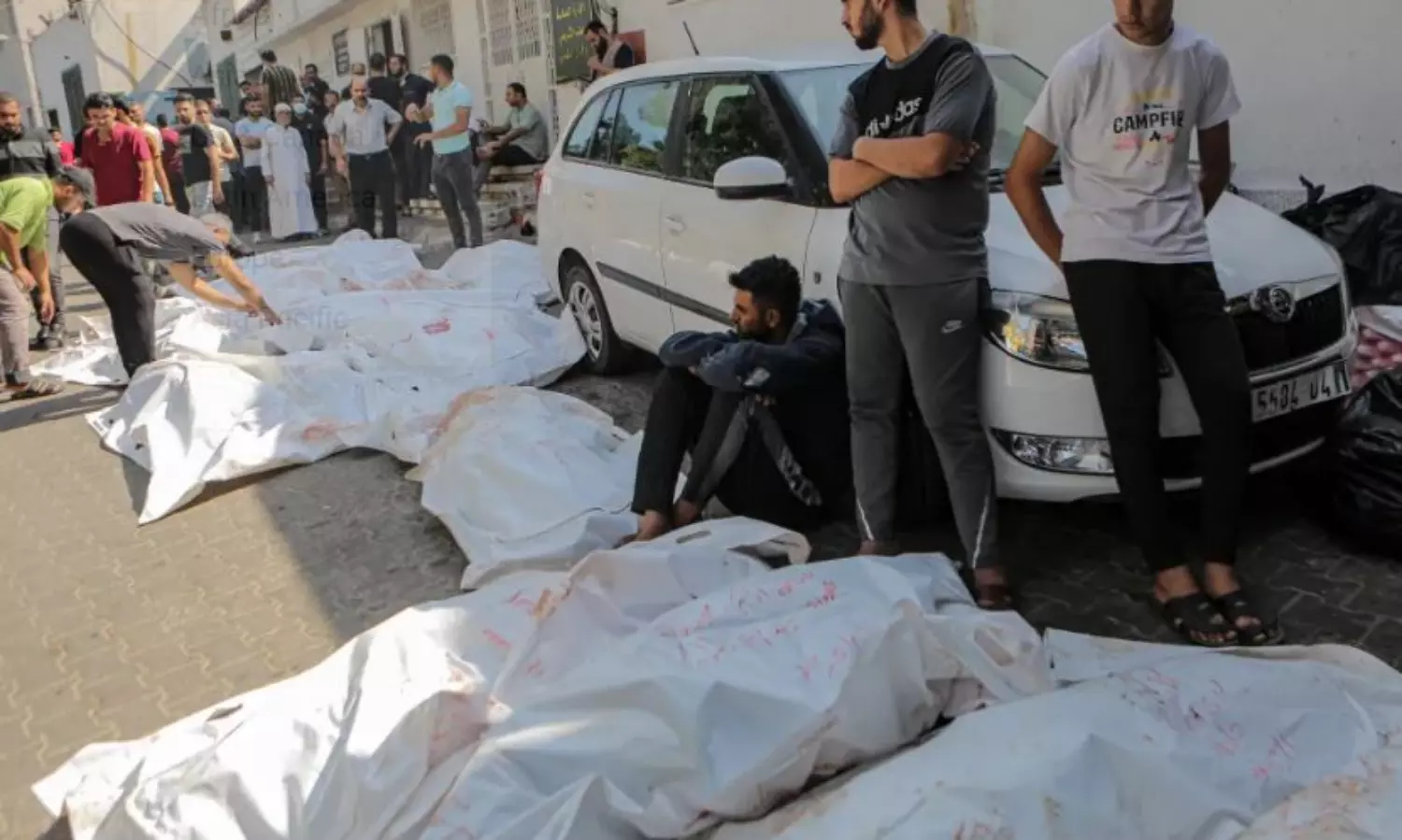 Gazan rebury bodies exhumed from cemetery