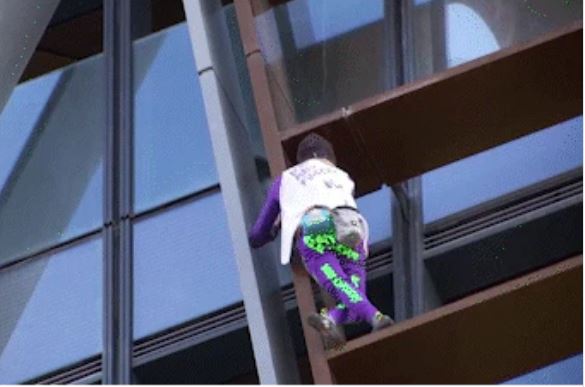 French climber scales Paris skyscraper in call for peace amid Israel-Hamas conflict